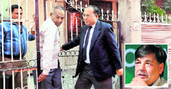 CBI officials raid the residence of CWG 2010 Organising Committee ex-secretary general Lalit Bhanot (inset) in New Delhi on Tuesday.