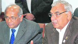 Haryana Chief Minister Bhupinder Singh Hooda with the Chairman of the AEC, Dr Sri Kumar Banerjee, in Chandigarh on Friday.