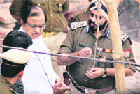 Union Home Minister P Chidambaram visits the site of the explosion at Varanasi