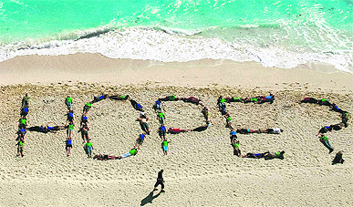 Greenpeace activists form the word hope as a question with their bodies during a demonstration near the site of UN Climate Change Conference in Cancun, Mexico. 