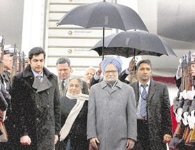 Prime Minister Manmohan Singh and his wife Gursharan Kaur being welcomed on their arrival at Tegel Military Airport in Berlin, Germany, on Saturday.