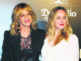 Actor Melanie Griffith (L) and daughter Stella Banderas arrive at the premiere of director Alejandro Gonzalez Inarritu's film Biutiful in Los Angeles on Tuesday. Biutiful is the official foreign language submission to the 2011 Academy Awards from Mexico