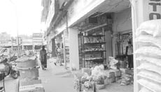 Verandahs of shops encroached upon by shopkeepers at Phase V in Mohali.