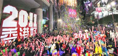 Revellers take part in New Year celebrations at Hong Kong's Times Square