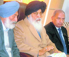 Parkash Singh Badal addresses the media in Chandigarh.