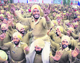 Punjab police jawans take part in an event to celebrate the New Year in Jalandhar on Saturday.