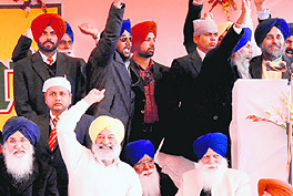 Deputy CM Sukhbir Badal addresses the crowd in Muktsar on Friday as Chief Minister Parkash Singh Badal and other SAD leaders look on.