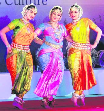 Hema Malini along with her daughters Esha (R) and Aahana performs during the launch of Namaste America, an initiative to promote better relations between India and America through exchange of cultures, in Mumbai.