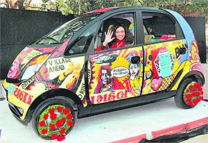 A Tata Nano, wrapped in pop art imagery by renowned artist Ketna Patel graces the India Art Summit at the Pragati Maidan in New Delhi.