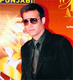 Actor Jimmy Shergill poses for lensmen at an award function in the city.