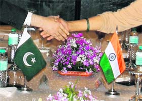 Foreign Secretary Nirupama Rao shakes hands with her Pakistani counterpart Salman Bashir during the meeting in Thimphu, Bhutan
