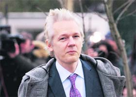 WikiLeaks founder Julian Assange arrives at Belmarsh Magistrates Court in London