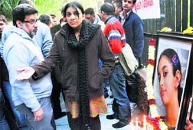 Rajesh and Nupur Talwar during a signature campaign seeking justice in their daughter Aarushis murder case, near Parliament