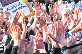 CLAMOUR GROWS: Anti-government protesters chant slogans at a demonstration in Algiers