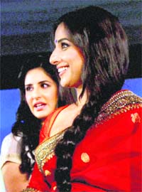 Bollywood actors Vidya Balan and Katrina Kaif during the NDTV Indian of the Year-2010 awards function in New Delhi. — PTI photo