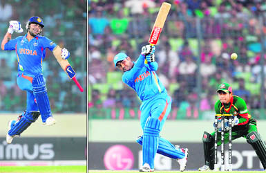 Virat Kohli (L) celebrates after scoring his century while Virender Sehwag plays a shot during the ICC Cricket World Cup group B match between India and Bangladesh in Dhaka on Saturday.