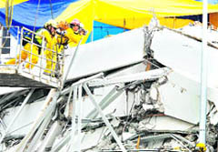 Rescue workers use thermal imaging cameras to search for signs of life, in Christchurch.