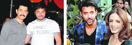 Actors Aamir Khan and Sohail Khan during the inauguration of a store in Mumbai on Sunday evening. <p>Actor Hrithik Roshan with wife Sussanne speaks to the media during a inauguration party in Mumbai.