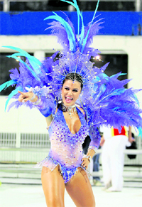 A reveller does samba during a carnival at Sao Paulo