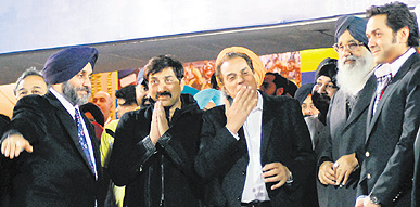 Sukhbir Badal, Sunny Deol, Dharmendra, Daler Mehandi, Parkash Singh Badal and Bobby Deol at the closing ceremony of the Punjab Games in Jalandhar on Sunday.