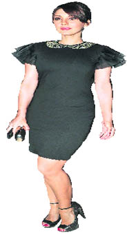 Minissha Lamba looks stunning in a black dress.