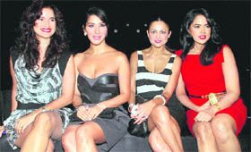 (L-R) Bollywood actors Sushma Reddy, Sophie Chaudhary, Amrita Arora and Sameera Reddy during Lakme Fashion Week in Mumbai on Saturday.