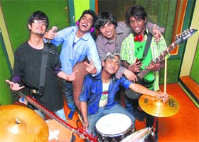 HAPPY TUNE: Members of Driving on Tracks in a jubilant mood