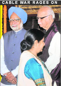 PM Manmohan Singh and BJP leaders LK Advani and Sushma Swaraj in Parliament.