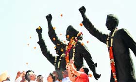 Saluting the heroes: Floral tributes being paid to Shaheed Bhagat Singh, Rajguru and Sukhdev on their martyrdom day at the Jagraon bridge in Ludhiana