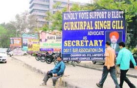 Hoardings put up at the court complex by a few lawyers who are contesting the District Bar Association poll