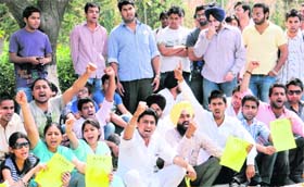 Members of the Student Organisation of Panjab University stage a protest in support of their demands