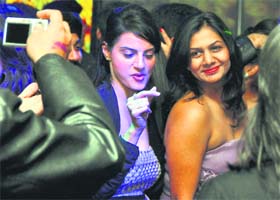 Groovy times: Youngsters shake a leg at a party