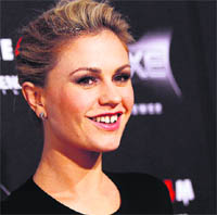 Anna Paquin poses at the premiere of Scream 4 at the Grauman's Chinese Theatre in Hollywood, California