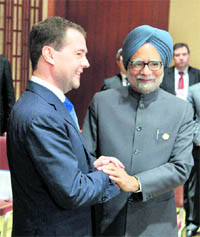 Russian President Dmitry Medvedev meets PM Manmohan Singh at Sanya on Wednesday.
