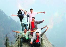 Soaring high: Vivek Sharma (in pink T-shirt with friends)