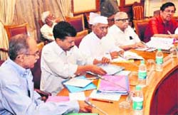 Lokpal Bill drafting committee co-chairman Shanti Bhushan (2nd R) with members Anna Hazare (C), Santosh Hegde (R), Prashant Bhushan (L) and Arvind Kejriwal during the first meeting of the panel at North Block in New Delhi on Saturday