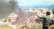 The site where a Pawan Hans helicopter with 23 persons on board caught fire and crashed into a gorge while landing in Tawang.