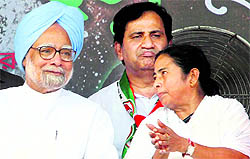 Prime Minister Manmohan Singh and Trinamool Congress chief Mamata Banerjee during an election campaign rally for Assembly polls at Dum Dum in North 24 Parganas on Saturday.