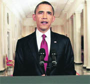 President Barack Obama reads his statement after making a televised statement on the death of Osama bin Laden from the White House on Sunday.