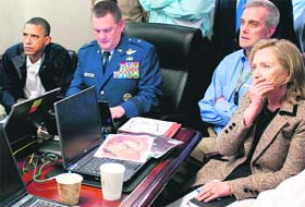 A photograph released by the US Government shows President Barack Obama and Secretary of State Hillary Clinton (R) receiving updates on Operation Geronimo against Osama bin Laden in the Situation Room of the White House in Washington DC on Sunday