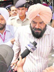 CBI officials produce Bhag Singh, private secretary of Punjab Technical Education Department Minister Swarna Ram, at District Courts in Chandigarh 