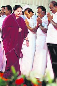 J Jayalalithaa walks away after taking oath as the Chief Minister of Tamil Nadu in Chennai on Monday