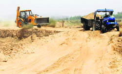 Illegal sand mining is being done in the Budh Ki Rau, near Khizrabad village of Mohali. 