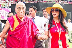 Punjab Kings XI co-owner Preity Zinta with His Holiness, the Dalai Lama, at Dharamsalas HPCA Stadium for a match between her team and Deccan Chargers on Saturday.