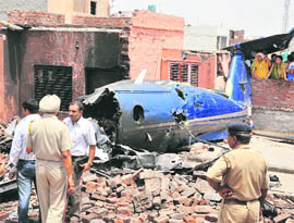 Debris of the plane that crashed into a densely populated residential colony in Faridabad on Wednesday night. 