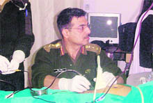 The procedurebeing performed by Col Devendra Arora.