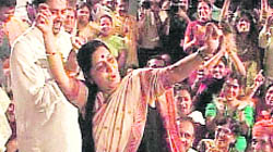 A TV grab shows BJP leader Sushma Swaraj dancing at Rajghat on Sunday night.