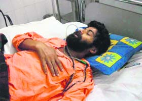 Swami Nigmanand in a hospital in Haridwar on April 27, prior to his being shifted to Dehradun