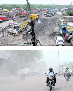 Unregulated truck parking, coupled with rainwater on road, causes problems for travellers in the railway yard, Daria