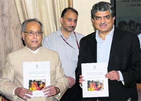 UIDAI Chairman Nandan Nilekani with FM Pranab Mukherjee in New Delhi on Tuesday